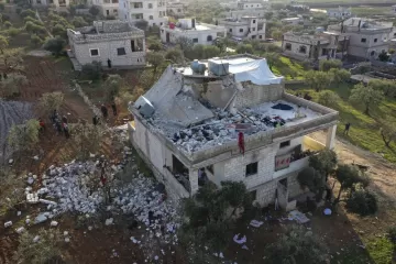 Lethal US raid on IS encounters a doll, crib, bomb, bullets